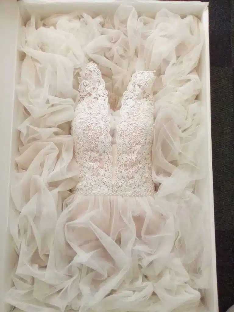 Wedding gown boxing in acid free chest